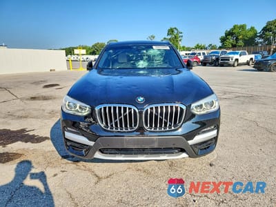 Piąte zdjęcie samochodu w środku: 2021 BMW X3 XDRIVE30I VIN:5UXTY5C01M9E51858 - miniatura