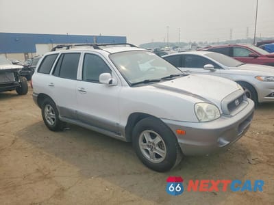 Czwarte zdjęcie samochodu z boku: 2004 HYUNDAI SANTA FE GLS VIN:KM8SC13EX4U705363 - miniatura