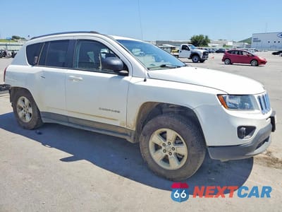 Czwarte zdjęcie samochodu z boku: 2014 JEEP COMPASS SPORT VIN:1C4NJCBA9ED593707 - miniatura