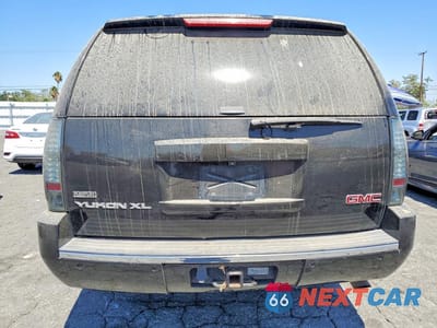 Zdjęcie 6 z 13 samochodu: 2010 GMC YUKON XL DENALI VIN:1GKUKMEF7AR122369 - miniatura