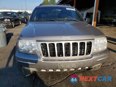 Piąte zdjęcie samochodu w środku: 1999 JEEP GRAND CHEROKEE LIMITED VIN:1J4GW68N0XC527880 - miniatura