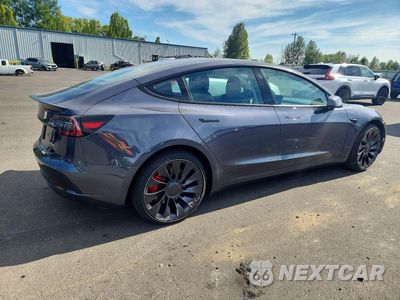 Trzecie zdjęcie samochodu z tyłu: 2023 TESLA MODEL 3 VIN:5YJ3E1EC5PF395473 - miniatura