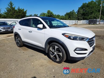 Czwarte zdjęcie samochodu z boku: 2017 HYUNDAI TUCSON LIMITED VIN:KM8J3CA22HU289010 - miniatura