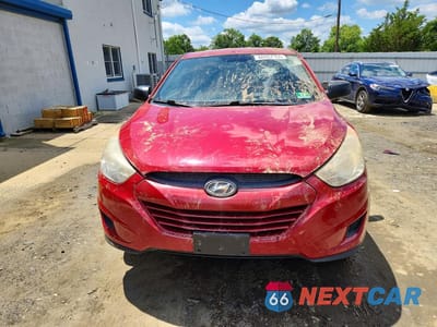 Piąte zdjęcie samochodu w środku: 2012 HYUNDAI TUCSON GL VIN:KM8JT3AB0CU489411 - miniatura