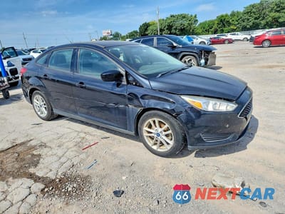 Czwarte zdjęcie samochodu z boku: 2018 FORD FOCUS SE VIN:1FADP3F28JL220404 - miniatura