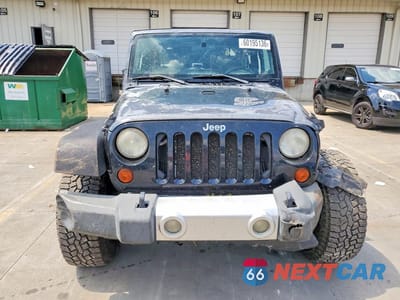 Piąte zdjęcie samochodu w środku: 2009 JEEP WRANGLER SAHARA VIN:1J4FA54179L700644 - miniatura