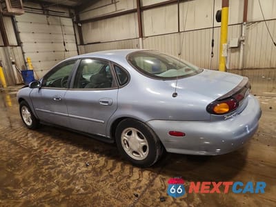 Drugie zdjęcie samochodu z przodu: 1997 FORD TAURUS GL VIN:1FALP52U4VA237474 - miniatura