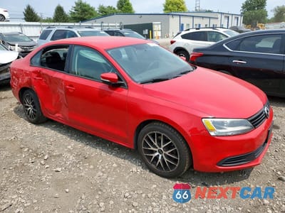 Czwarte zdjęcie samochodu z boku: 2014 VOLKSWAGEN JETTA SE VIN:3VWD17AJ4EM283647 - miniatura