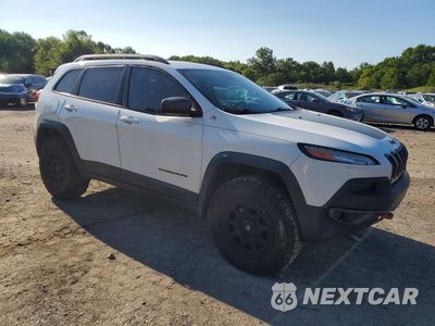 Czwarte zdjęcie samochodu z boku: 2016 JEEP CHEROKEE TRAILHAWK VIN:1C4PJMBSXGW253903 - miniatura