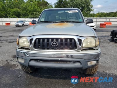 Piąte zdjęcie samochodu w środku: 2001 TOYOTA TACOMA BASE VIN:5TEWM72N21Z823661 - miniatura