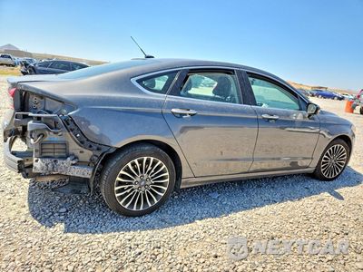 Trzecie zdjęcie samochodu z tyłu: 2017 FORD FUSION SE VIN:3FA6P0T9XHR141384 - miniatura