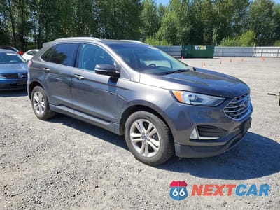Czwarte zdjęcie samochodu z boku: 2019 FORD EDGE SEL VIN:2FMPK4J92KBB89387 - miniatura
