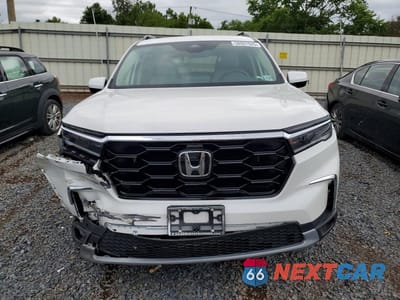 Piąte zdjęcie samochodu w środku: 2024 HONDA PILOT TOURING VIN:5FNYG1H7XRB041191 - miniatura