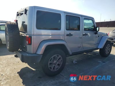 Czwarte zdjęcie samochodu z boku: 2015 JEEP WRANGLER UNLIMITED RUBICON VIN:1C4BJWFGXFL752423 - miniatura