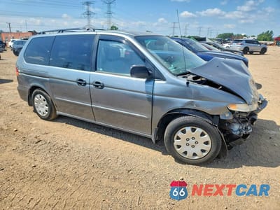 Czwarte zdjęcie samochodu z boku: 2000 HONDA ODYSSEY LX VIN:2HKRL1859YH512701 - miniatura