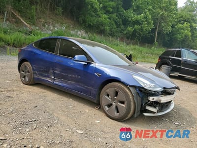Czwarte zdjęcie samochodu z boku: 2019 TESLA MODEL 3 VIN:5YJ3E1EA9KF208291 - miniatura