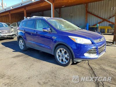 Czwarte zdjęcie samochodu z boku: 2016 FORD ESCAPE TITANIUM VIN:1FMCU9JX0GUA55192 - miniatura