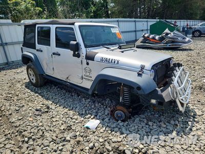 Czwarte zdjęcie samochodu z boku: 2012 JEEP WRANGLER UNLIMITED SPORT VIN:1C4BJWDG7CL267641 - miniatura