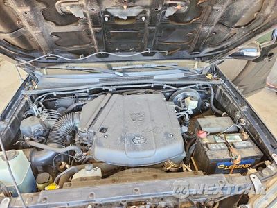 Zdjęcie 11 z 12 samochodu: 2015 TOYOTA TACOMA V6 VIN:3TMLU4ENXFM184477 - miniatura