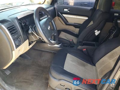 Zdjęcie 7 z 13 samochodu: 2009 HUMMER H3 VIN:5GTEN13E798104495 - miniatura