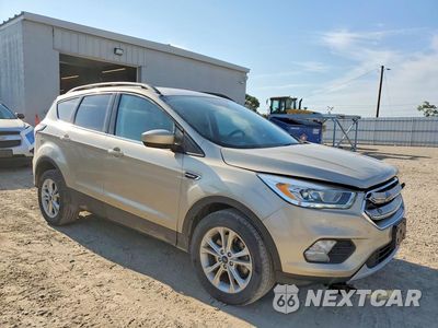 Czwarte zdjęcie samochodu z boku: 2017 FORD ESCAPE SE VIN:1FMCU9GD8HUE34066 - miniatura