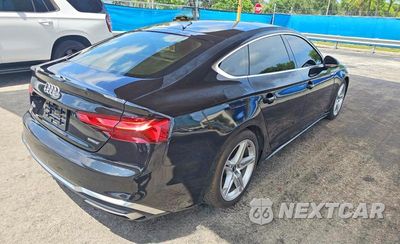 Czwarte zdjęcie samochodu z boku: 2021 AUDI A5 PREMIUM 45 VIN:WAUDACF59MA056857 - miniatura
