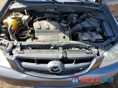 Zdjęcie 12 z 13 samochodu: 2002 MAZDA TRIBUTE LX VIN:4F2CU08192KM29546 - miniatura
