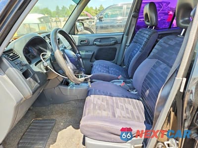 Zdjęcie 7 z 13 samochodu: 1997 TOYOTA RAV4 BASE VIN:JT3GP10V0V0013449 - miniatura