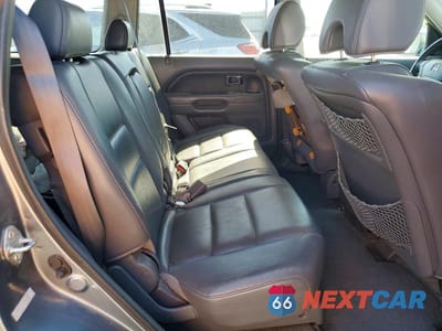 Zdjęcie 11 z 13 samochodu: 2006 HONDA PILOT EX VIN:2HKYF18696H544685 - miniatura