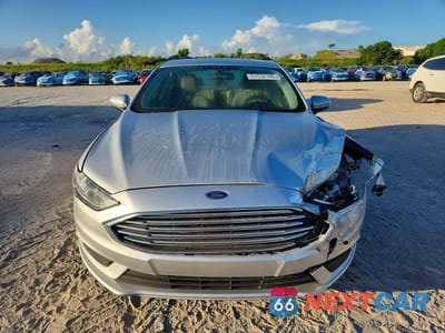 Piąte zdjęcie samochodu w środku: 2018 FORD FUSION SE HYBRID VIN:3FA6P0LU1JR200896 - miniatura