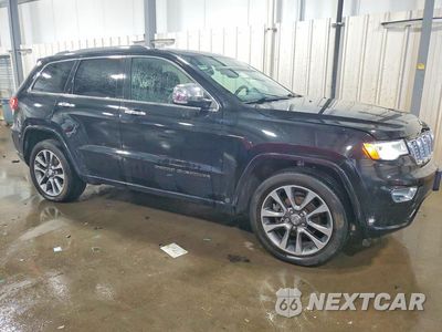 Czwarte zdjęcie samochodu z boku: 2017 JEEP GRAND CHEROKEE OVERLAND VIN:1C4RJFCG1HC883052 - miniatura