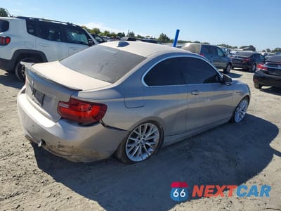Trzecie zdjęcie samochodu z tyłu: 2014 BMW 228 I VIN:WBA1F5C51EV256131 - miniatura