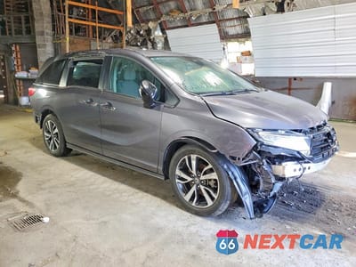 Czwarte zdjęcie samochodu z boku: 2023 HONDA ODYSSEY TOURING VIN:5FNRL6H82PB017910 - miniatura