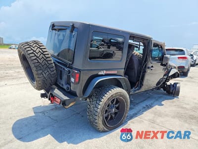 Trzecie zdjęcie samochodu z tyłu: 2014 JEEP WRANGLER UNLIMITED SAHARA VIN:1C4BJWEG5EL197848 - miniatura