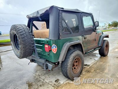 Trzecie zdjęcie samochodu z tyłu: 2000 JEEP WRANGLER / TJ SPORT VIN:1J4FA49S6YP724694 - miniatura