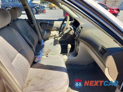 Zdjęcie 7 z 12 samochodu: 1999 TOYOTA COROLLA VE VIN:1NXBR12E1XZ140053 - miniatura