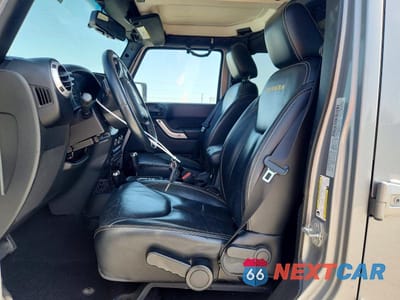 Zdjęcie 7 z 14 samochodu: 2015 JEEP WRANGLER UNLIMITED SAHARA VIN:1C4BJWEG0FL563913 - miniatura