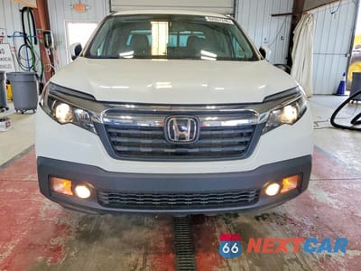 Piąte zdjęcie samochodu w środku: 2020 HONDA RIDGELINE RTL VIN:5FPYK3F56LB013494 - miniatura