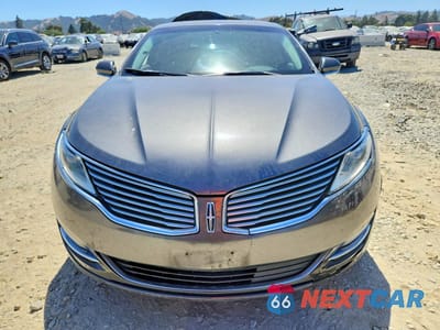 Piąte zdjęcie samochodu w środku: 2016 LINCOLN MKZ HYBRID VIN:3LN6L2LU2GR630605 - miniatura