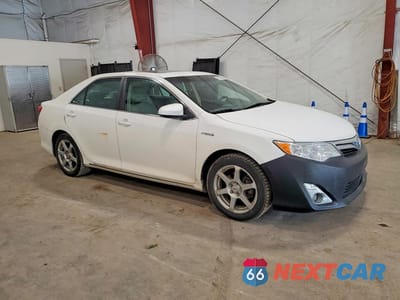 Czwarte zdjęcie samochodu z boku: 2012 TOYOTA CAMRY HYBRID XLE VIN:4T1BD1FK3CU059970 - miniatura