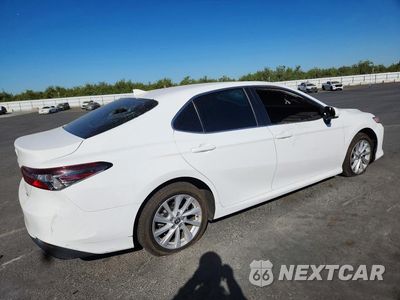 Trzecie zdjęcie samochodu z tyłu: 2024 TOYOTA CAMRY LE VIN:4T1C11AK7RU847650 - miniatura