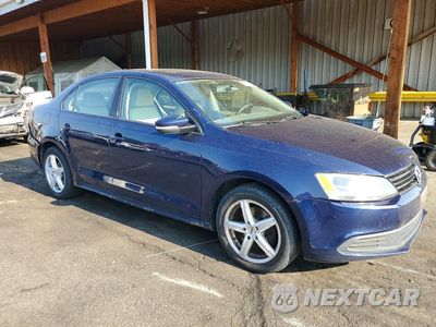 Czwarte zdjęcie samochodu z boku: 2011 VOLKSWAGEN JETTA SE VIN:3VWDX7AJ6BM338433 - miniatura