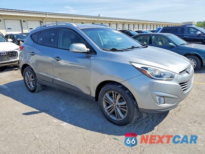 Czwarte zdjęcie samochodu z boku: 2014 HYUNDAI TUCSON SE VIN:KM8JU3AG9EU821793 - miniatura