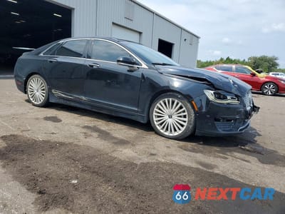Czwarte zdjęcie samochodu z boku: 2017 LINCOLN MKZ HYBRID RESERVE VIN:3LN6L5MU7HR602672 - miniatura