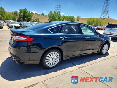 Trzecie zdjęcie samochodu z tyłu: 2014 FORD FUSION TITANIUM PHEV VIN:3FA6P0SU7ER136094 - miniatura