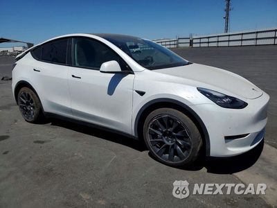 Czwarte zdjęcie samochodu z boku: 2021 TESLA MODEL Y VIN:5YJYGDEE4MF199376 - miniatura