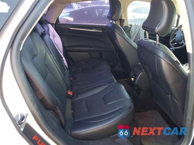 Zdjęcie 10 z 13 samochodu: 2017 FORD FUSION TITANIUM HEV VIN:3FA6P0RU3HR315954 - miniatura