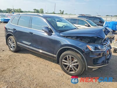 Czwarte zdjęcie samochodu z boku: 2015 VOLKSWAGEN TOUAREG V6 VIN:WVGEF9BP5FD004416 - miniatura