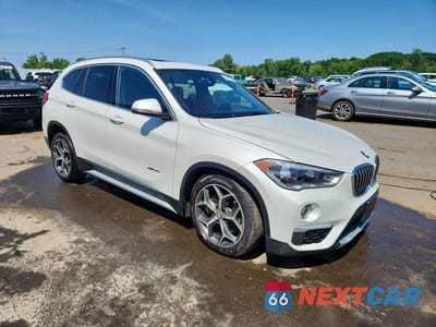 Czwarte zdjęcie samochodu z boku: 2018 BMW X1 XDRIVE28I VIN:WBXHT3C38J5K31303 - miniatura