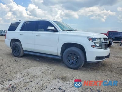 Czwarte zdjęcie samochodu z boku: 2019 CHEVROLET TAHOE POLICE VIN:1GNLCDECXKR272656 - miniatura